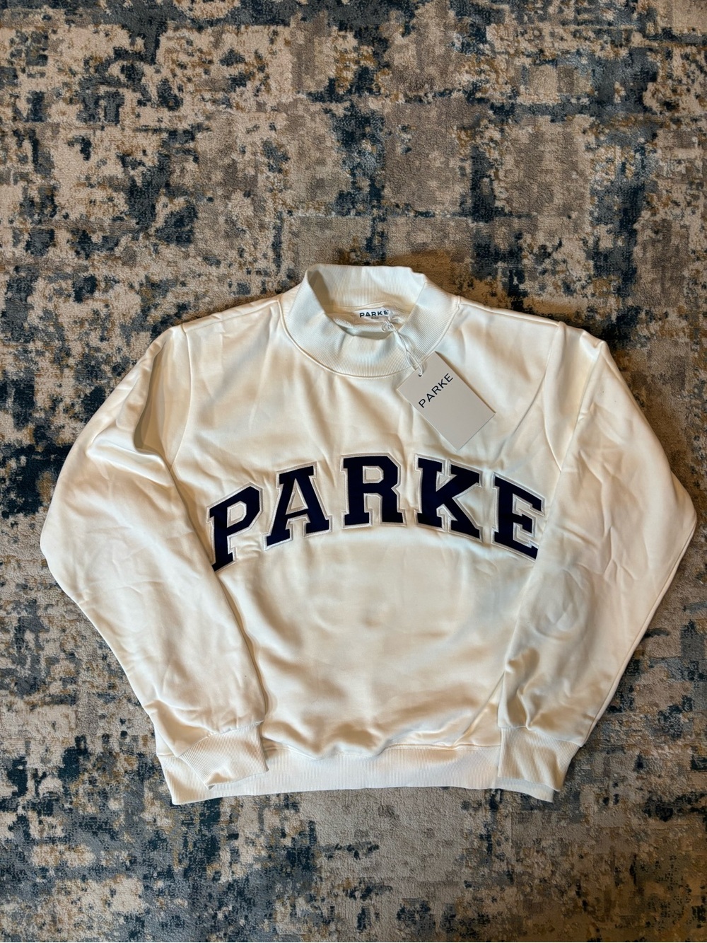 Parke White Mockneck Sweater with Navy Logo